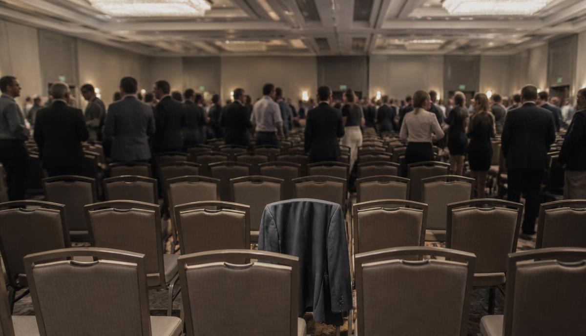 Attendee Collapses During Keynote — Corporate leadership summit, 800 attendees, hotel ballroom, day 2 morning keynote