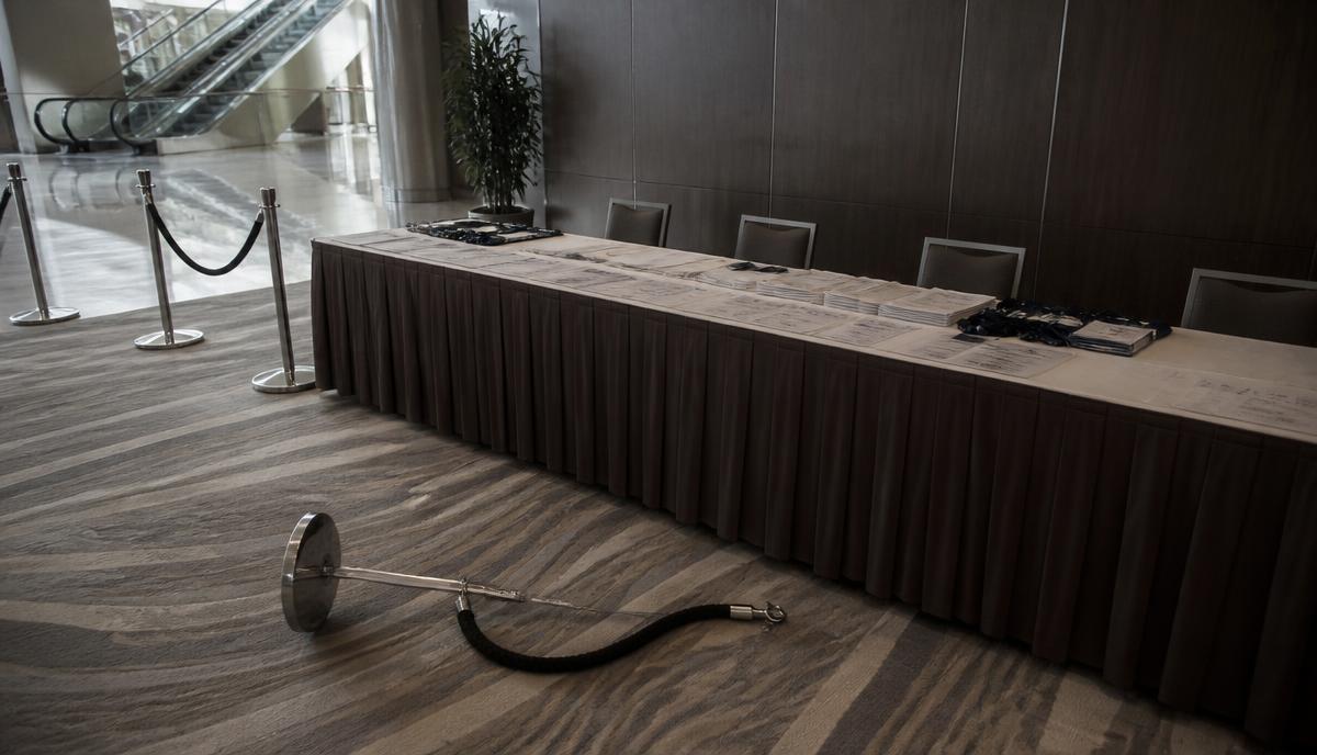 Aggressive Intruder at Registration — Tech industry conference, 600 attendees, convention center, morning registration rush